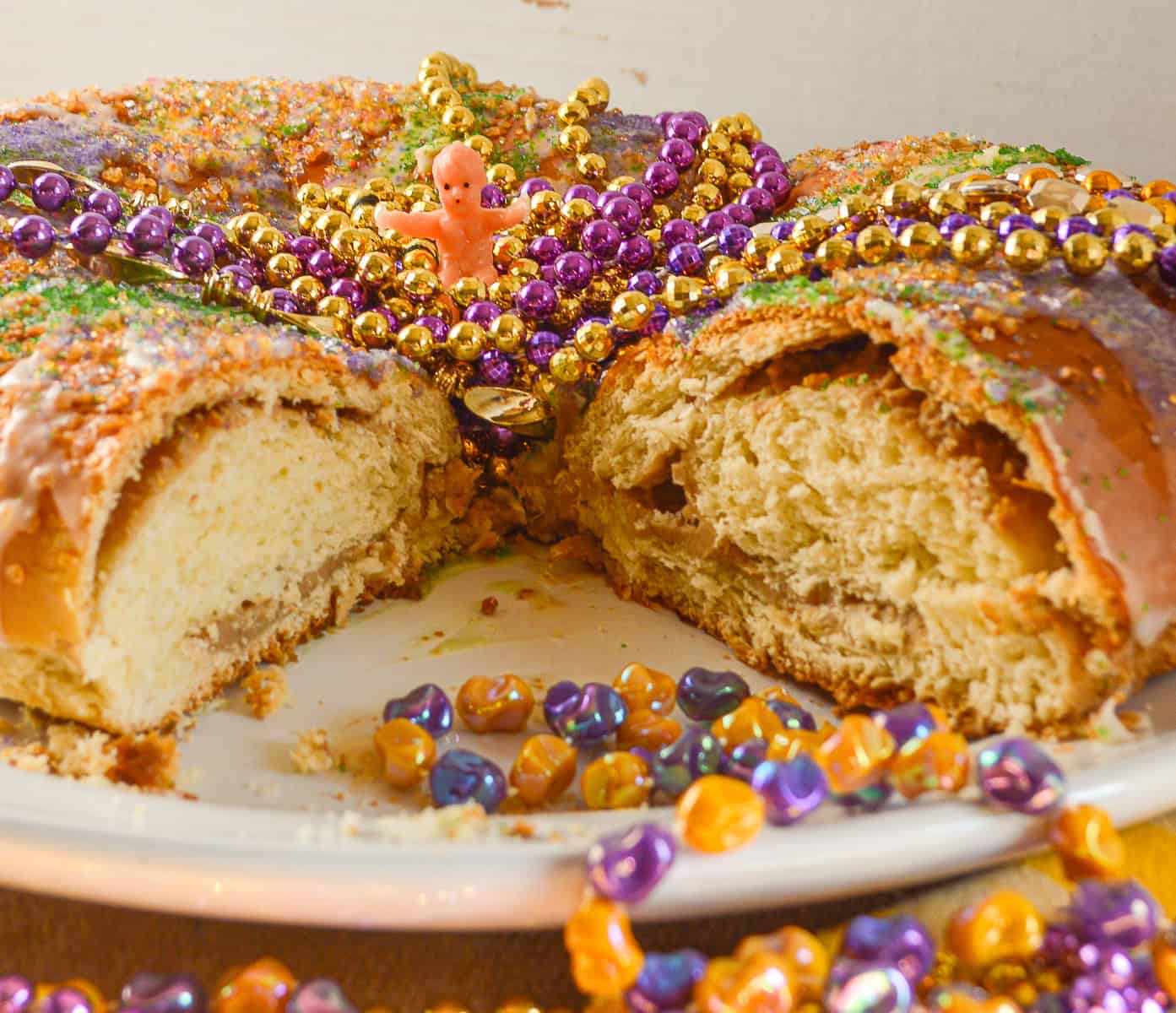 cream cheese king cake recipe on white platter