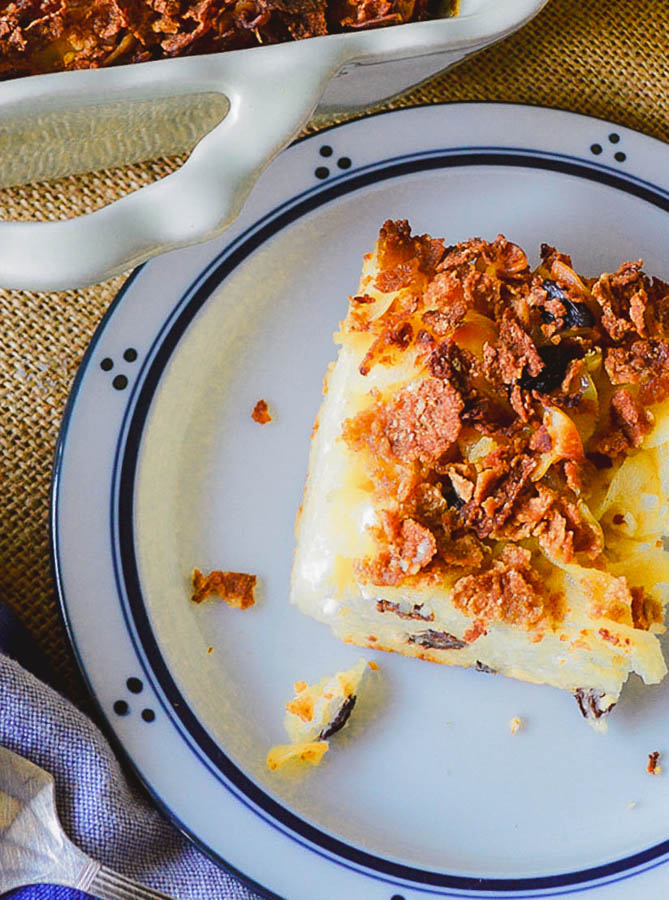 square of Jewish noodle kugel on round plate