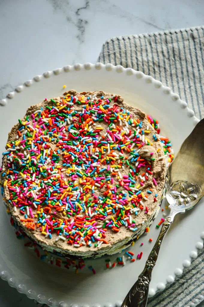 chocolate wafer icebox cake recipe on white plate and striped napkin with fork