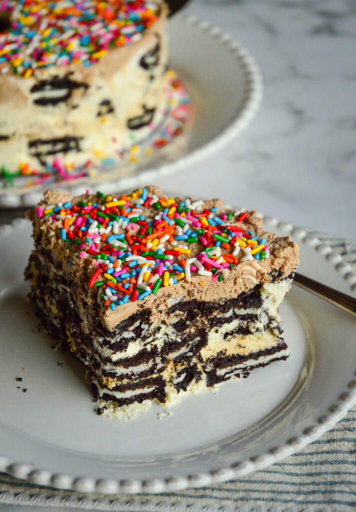 chocolate wafer icebox cake recipe on white plate and striped napkin with fork