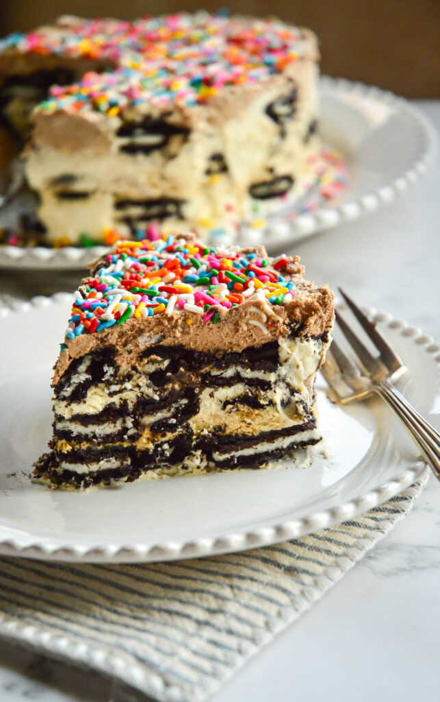 chocolate wafer icebox cake recipe on white plate and striped napkin with fork