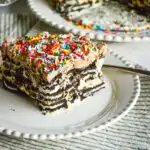 chocolate wafer icebox cake recipe on white plate and striped napkin with fork