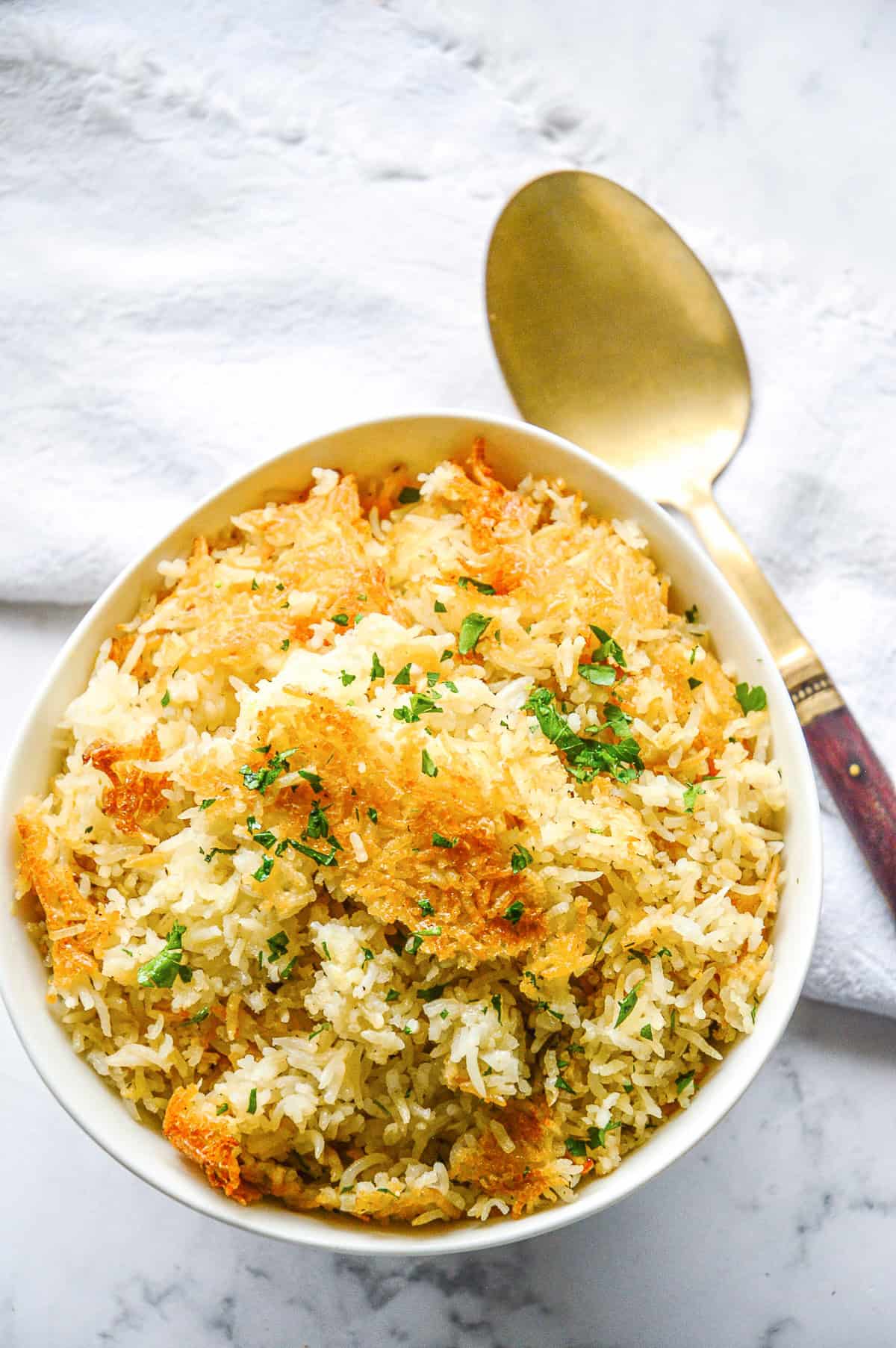 fluffy-oven-baked-rice-in-a-white-bowl