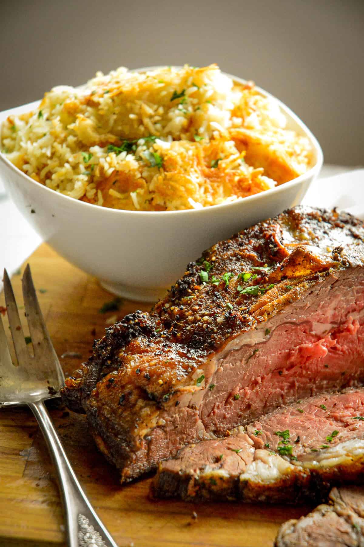 boneless ribeye roast with bowl of crisp rice