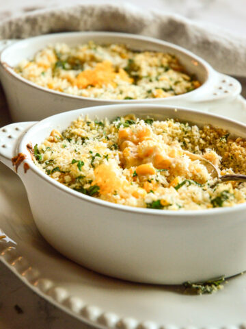baked corn casserole for thanksgiving in white oval baking dished