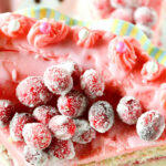 recipe for white chocolate icing dyed pink on a cranberry cake