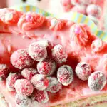 recipe for white chocolate icing dyed pink on a cranberry cake