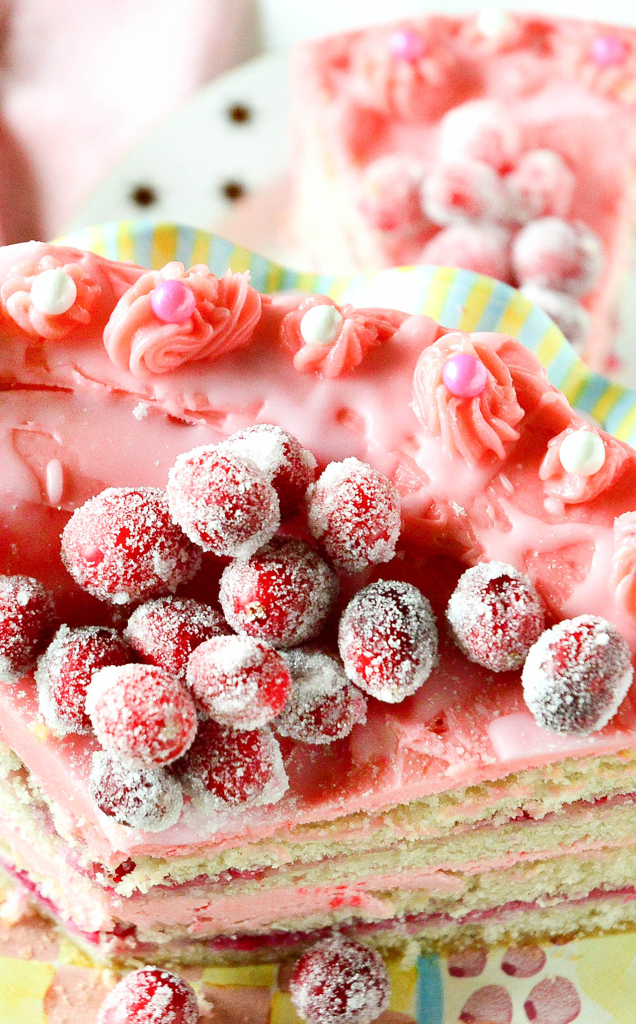 recipe for white chocolate icing dyed pink on a cranberry cake