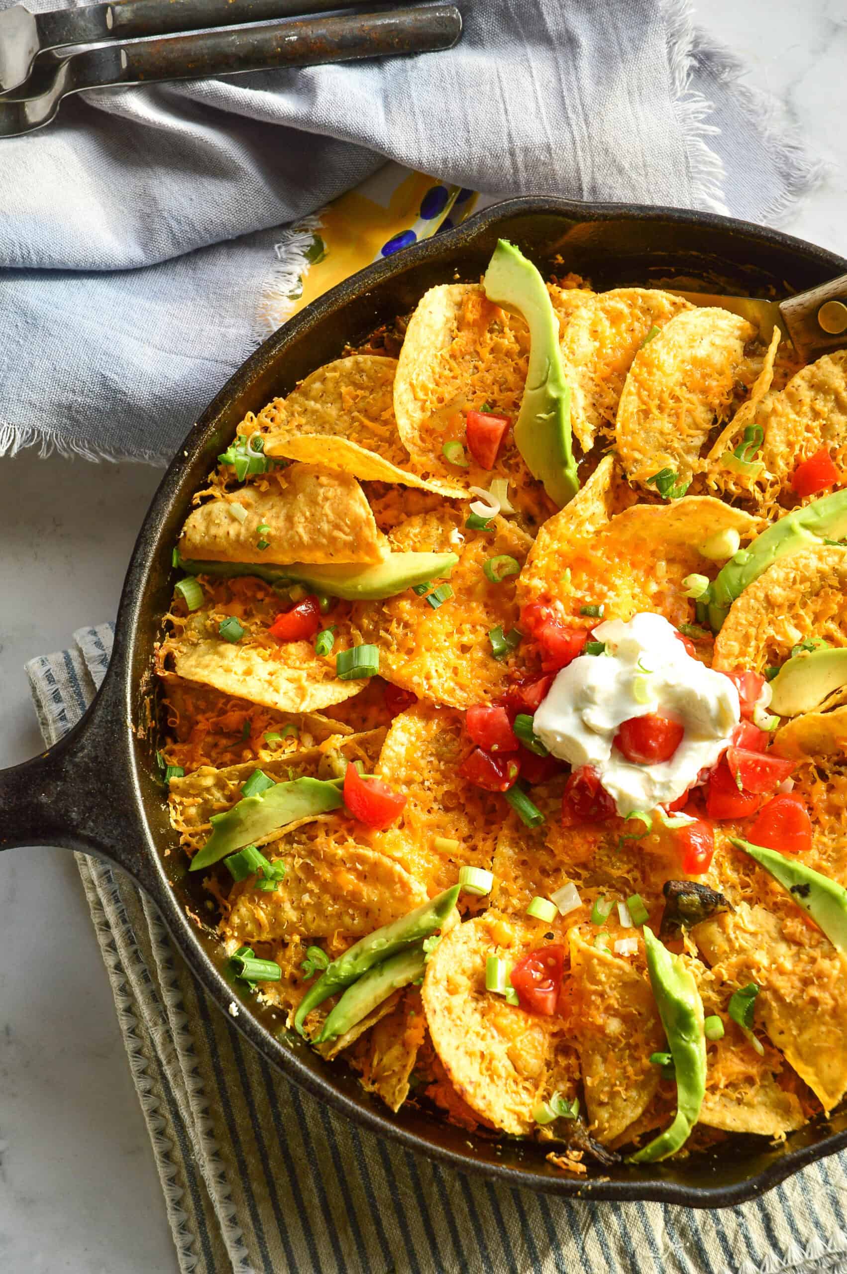 green chile chicken casserole recipe in cast iron skillet