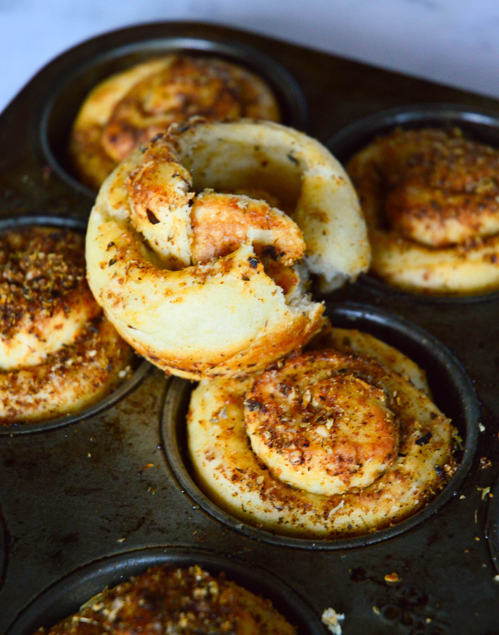pizza dough garlic rolls in muffin cup