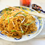 chow mein recipe in asian dish with chopsticks