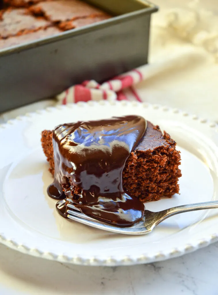 no dairy chocolate cake recipe on white plate with fork