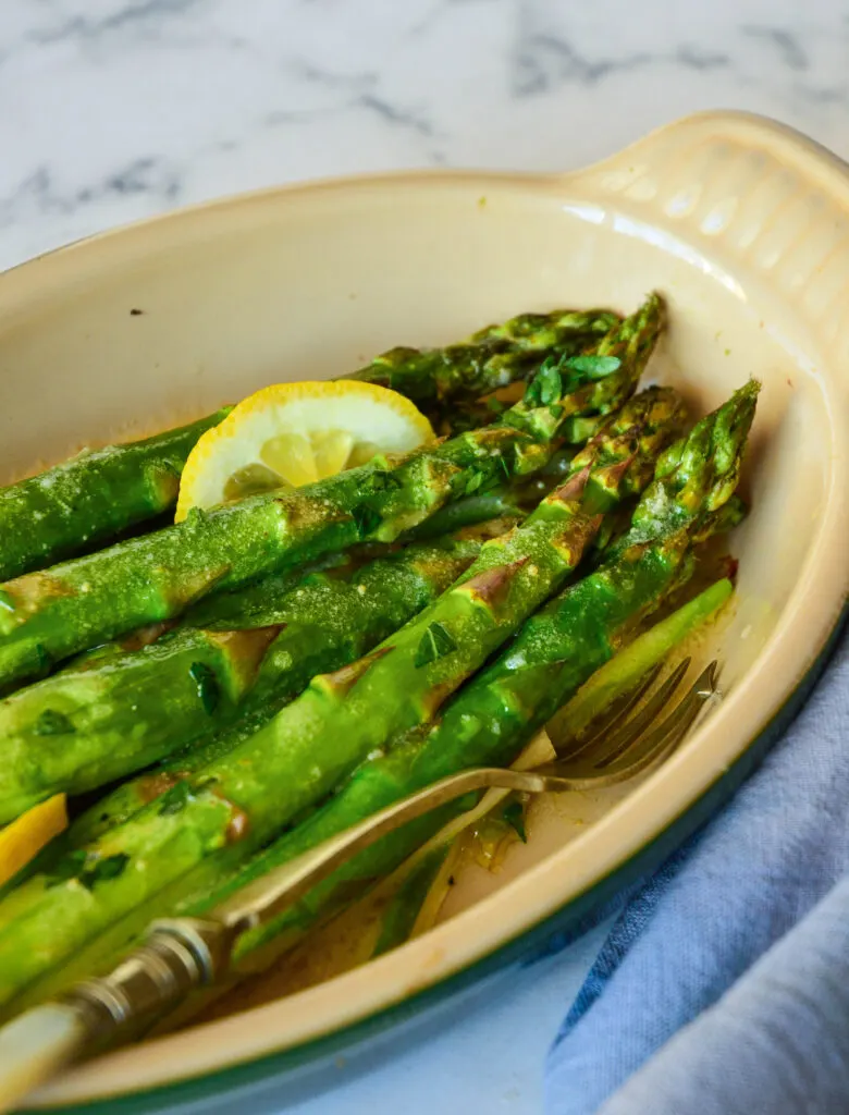 asparagus sauce recipes with asparagus in oval baking dish