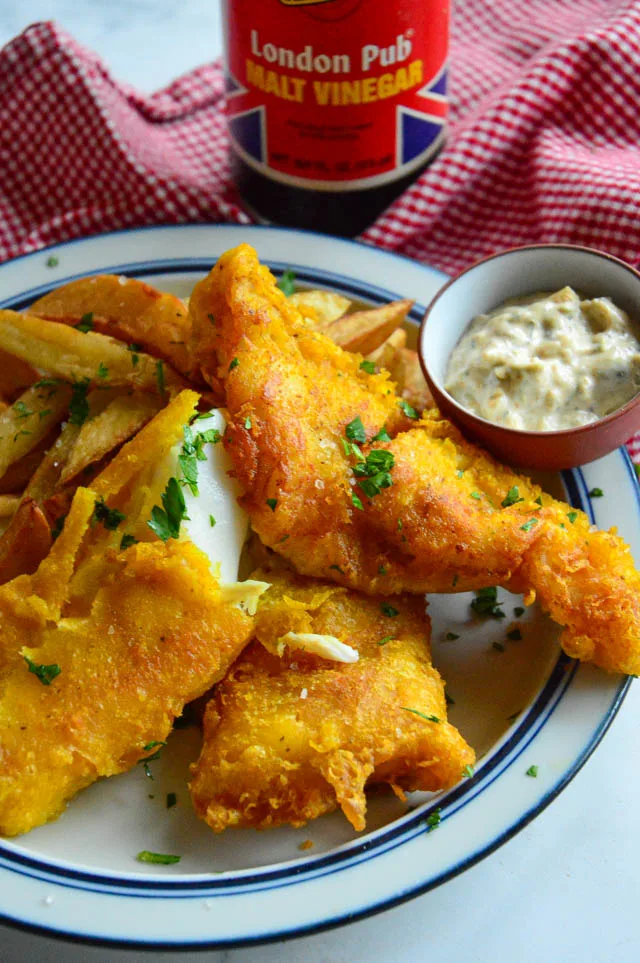 fried cod recipes with fries and malt vinegar and tartar sauce.