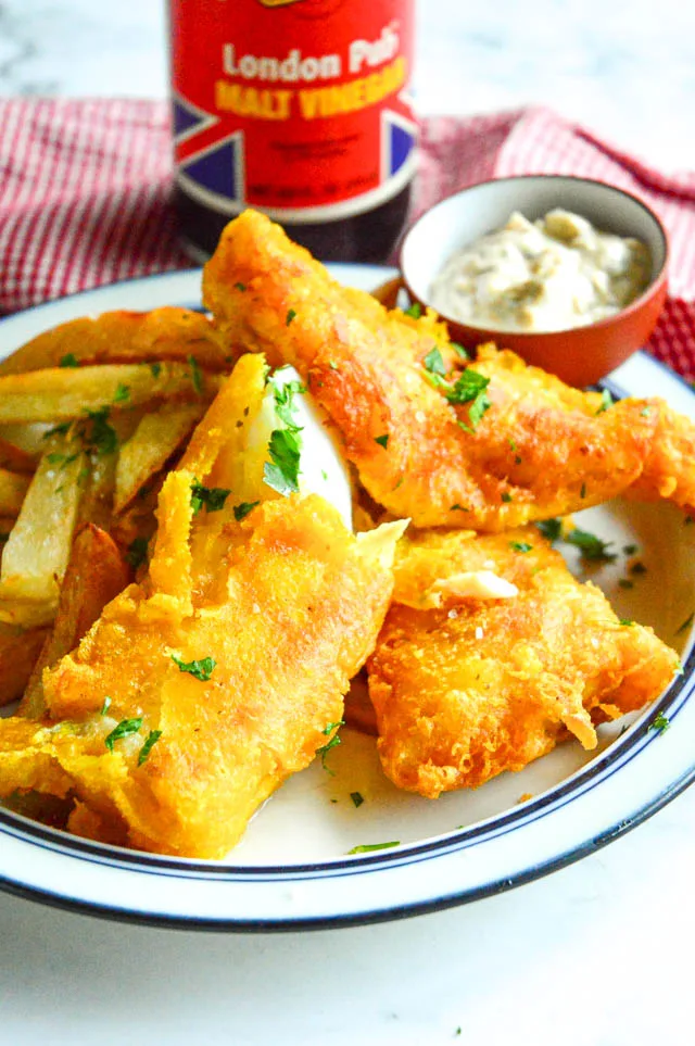 fried cod recipes on plate with fries.