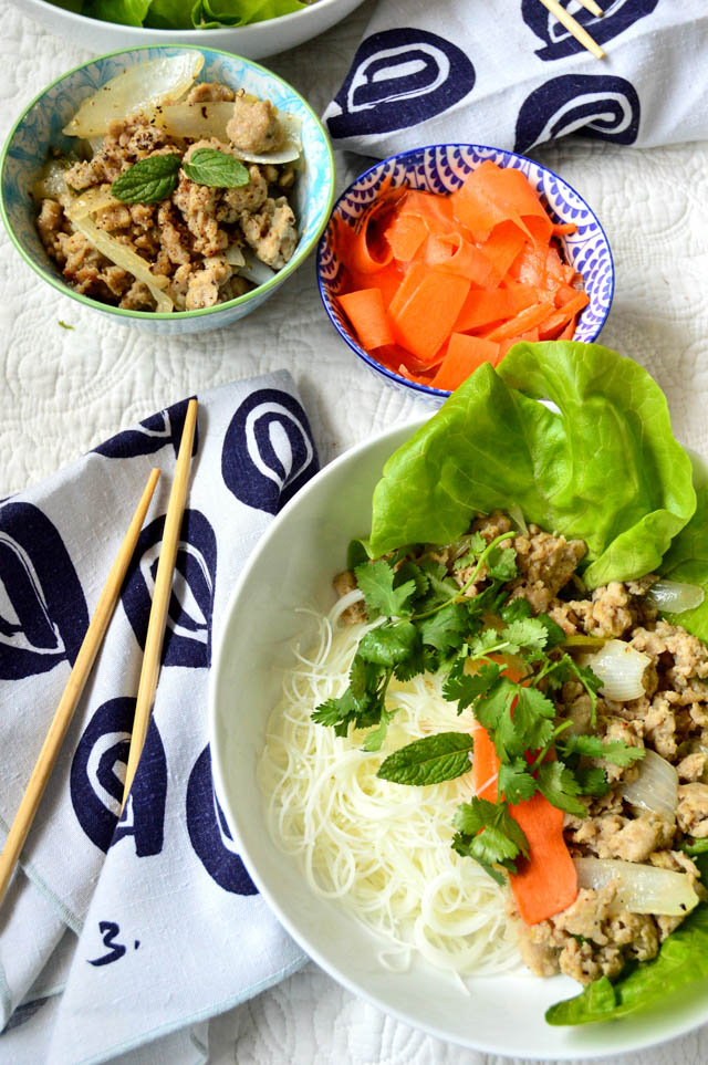 ground lemongrass chicken with rice vermicelli in bowl.