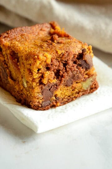 pumpkin brownie square on white plate