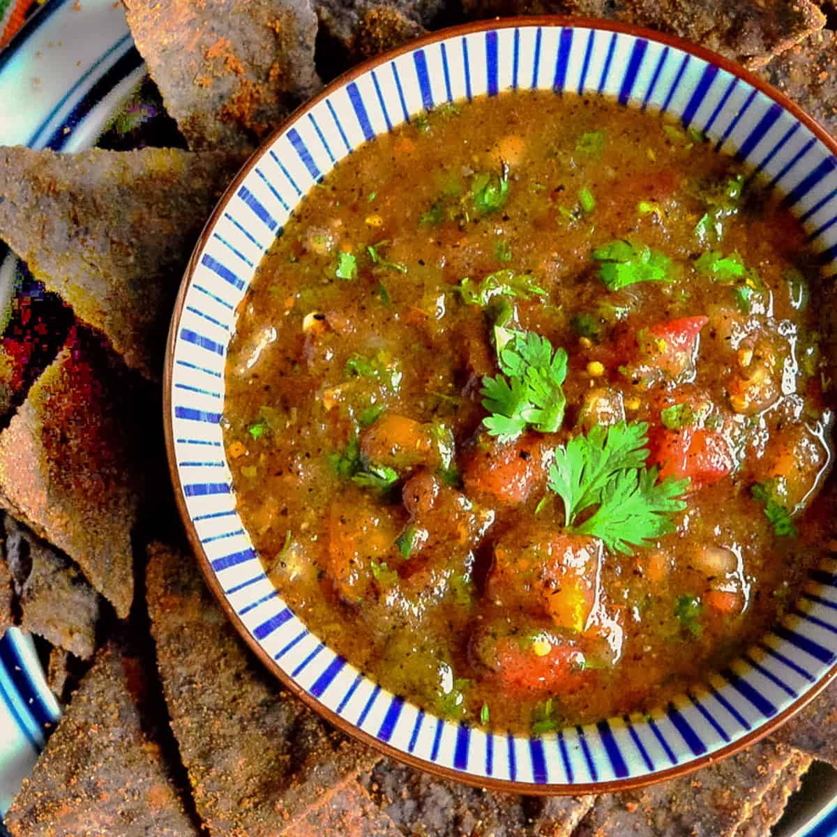 roasted tomato salsa in blue striped bowl
