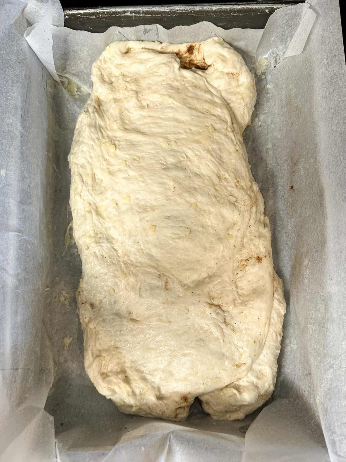cinnamon roll focaccia dough filled but unbaked