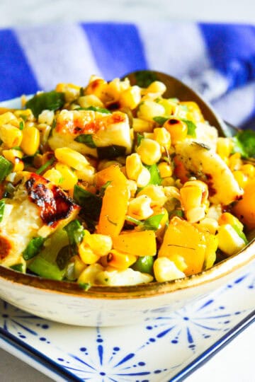 roasted corn salad with mango and halloumi