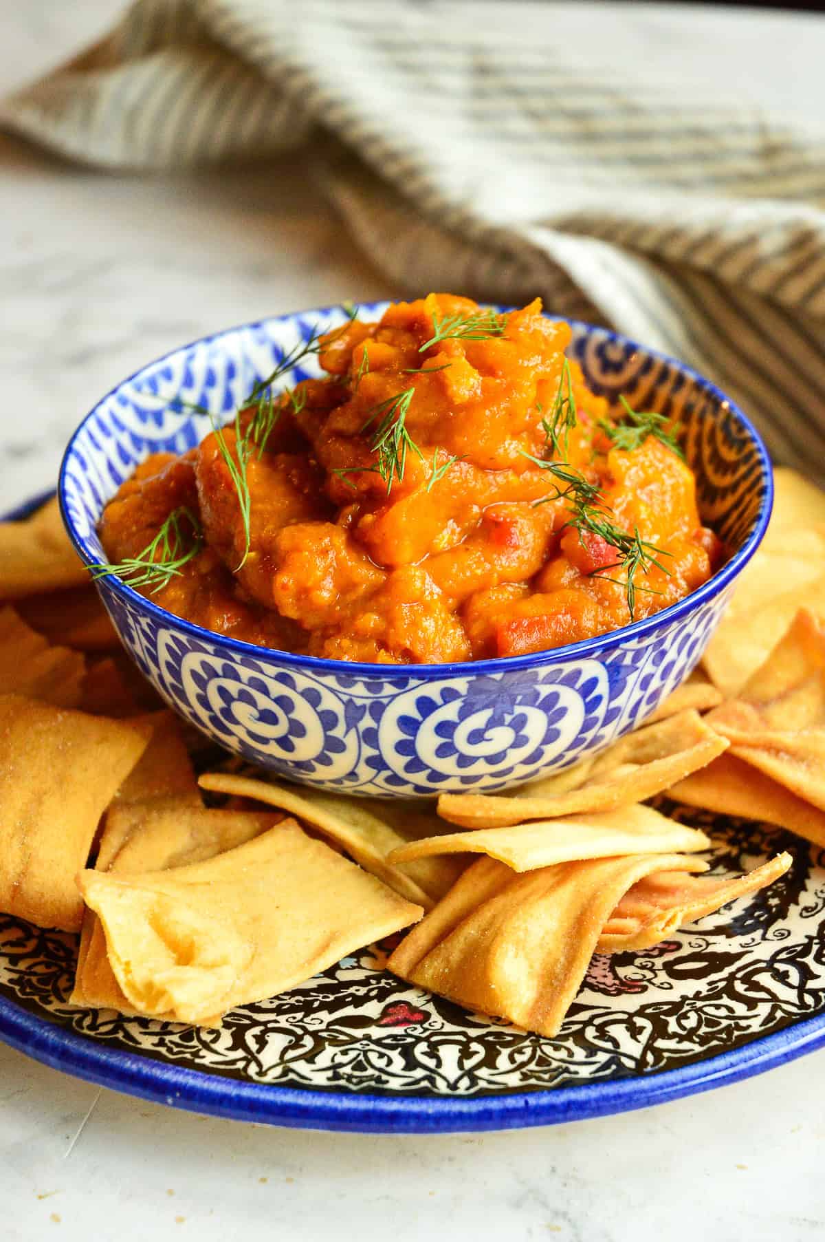 pumpkin dip-tershi- in blue and white bowl
