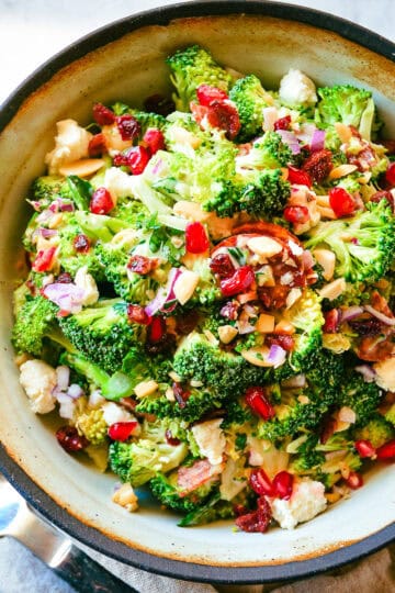 broccoli fall salad in brown rimmed bowl