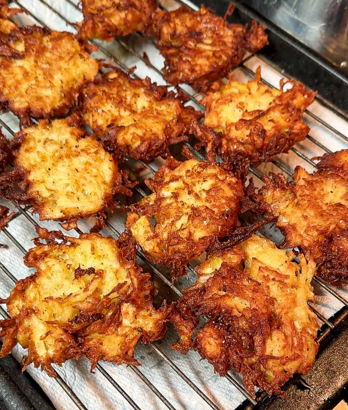 latkes draining on wire rack