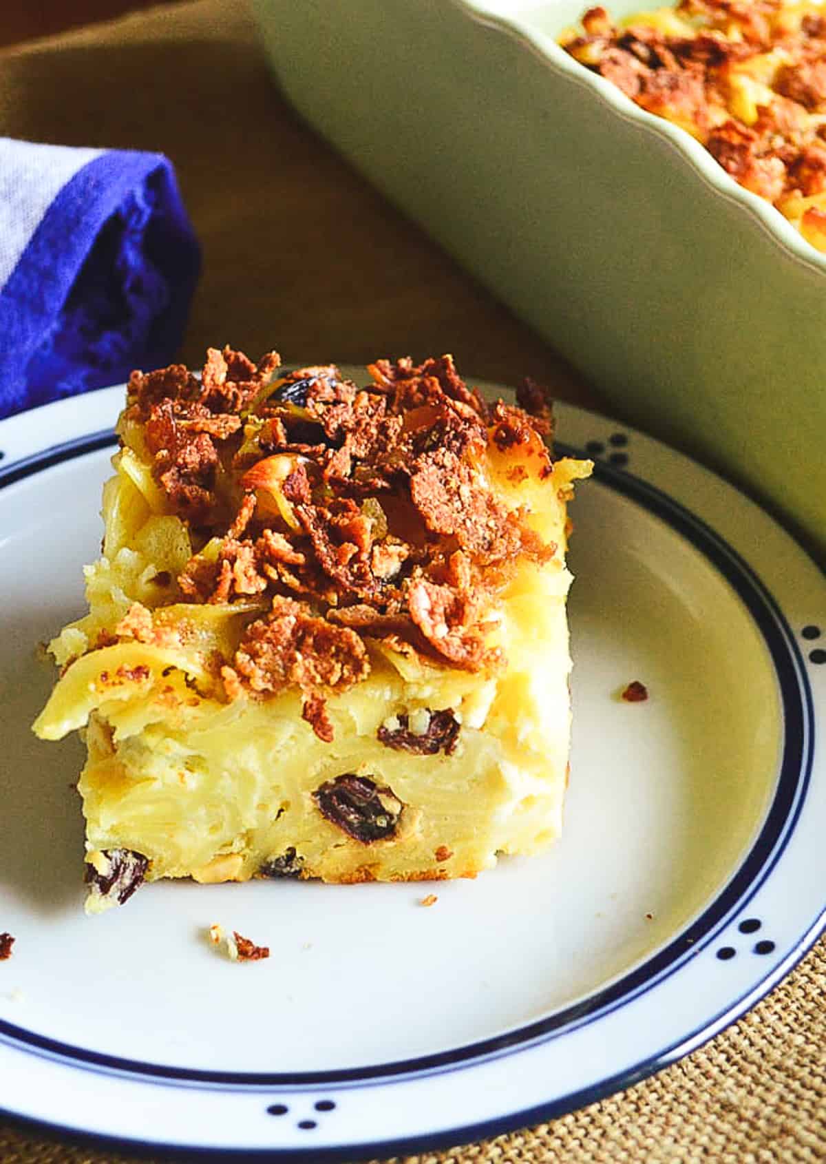 dairy noodle kugel square with cornflake topping and raisins
