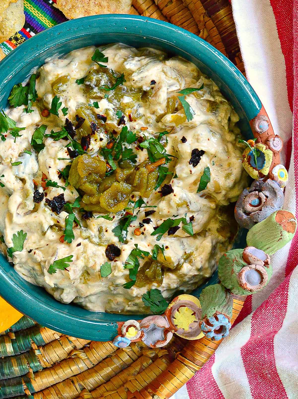 poblano cream cheese dip in cactus ceramic bowl