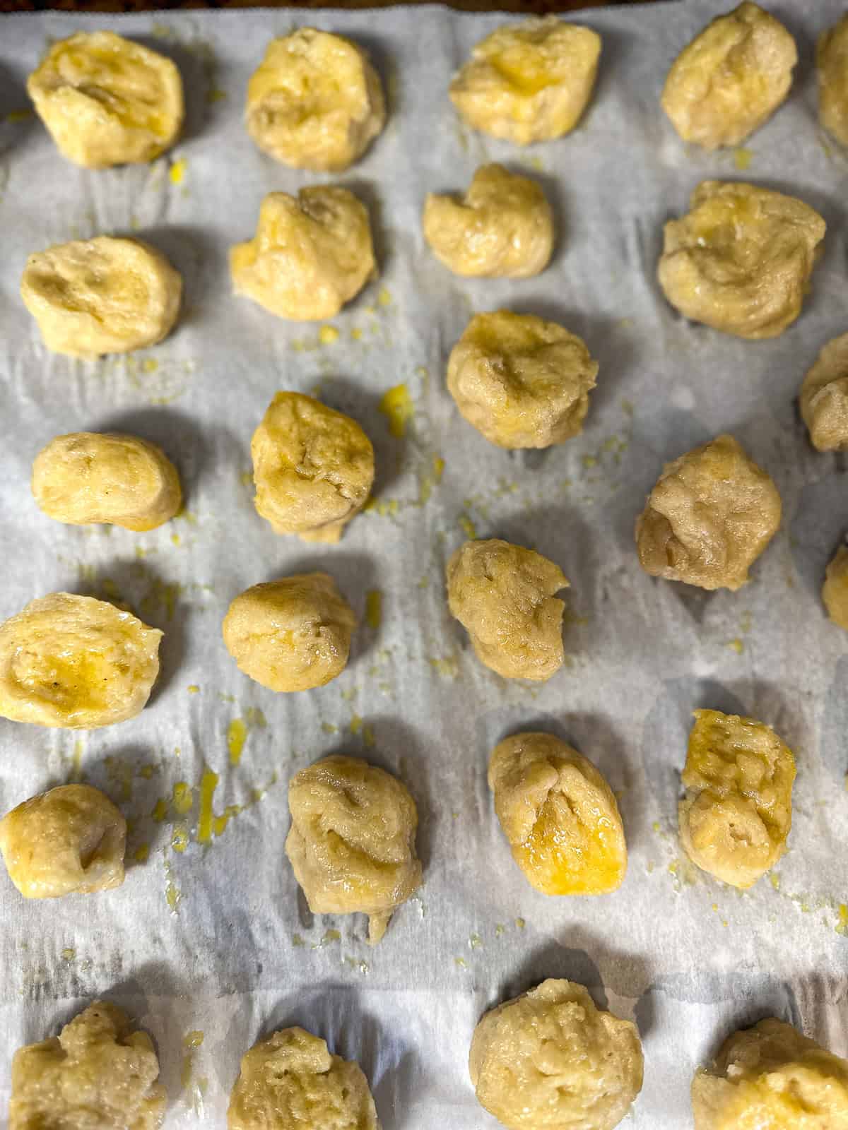 unbaked pizza dough pretzels brushed with egg wash