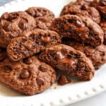 copycat crumble cookies with melty chocolate on white plate