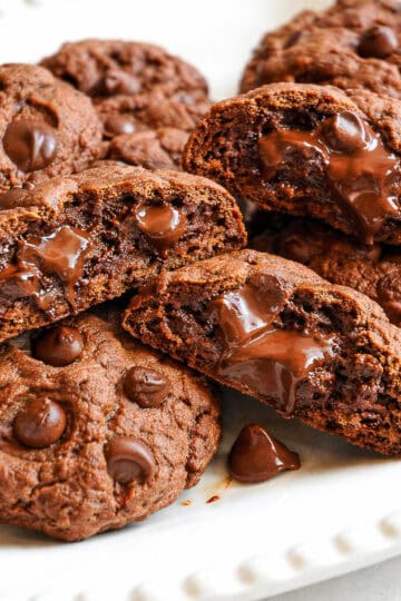 copycat crumble cookies with melty chocolate on white plate