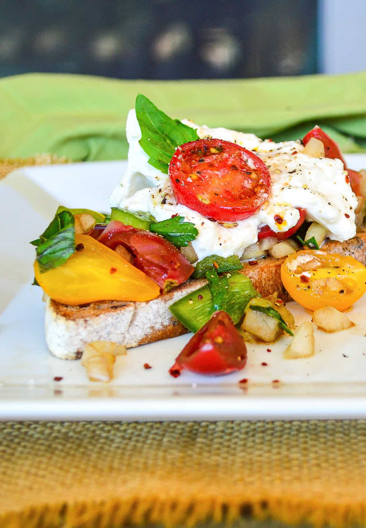 tomato bruschetta toast with burrata 