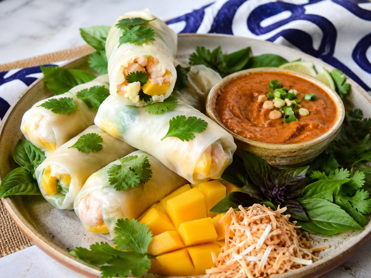 rice paper rolls with shrimp, mango and coconut plus peanut sauce